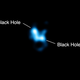 Image for article titled What happens when one black hole eats another black hole?